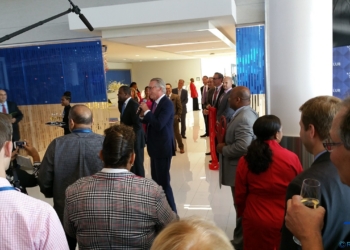 a group of people standing in a room