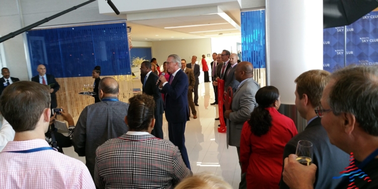 a group of people standing in a room