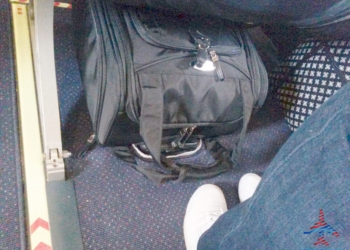 a black bag on a blue carpet