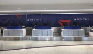 a group of people at a check in counter