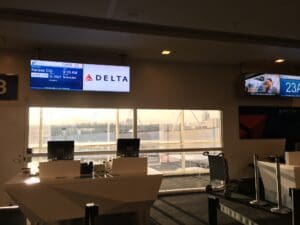 a desk with computers in a room