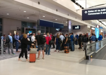 a group of people in a terminal