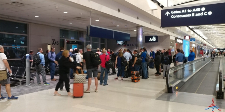 a group of people in a terminal