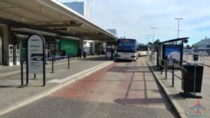 a bus stop with a bus stop