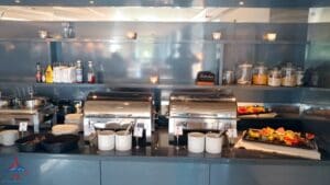a buffet line with food on the counter