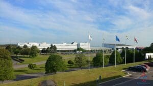 a building with flags in the background