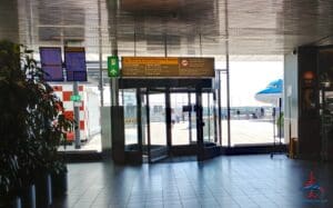 a glass door to an airport
