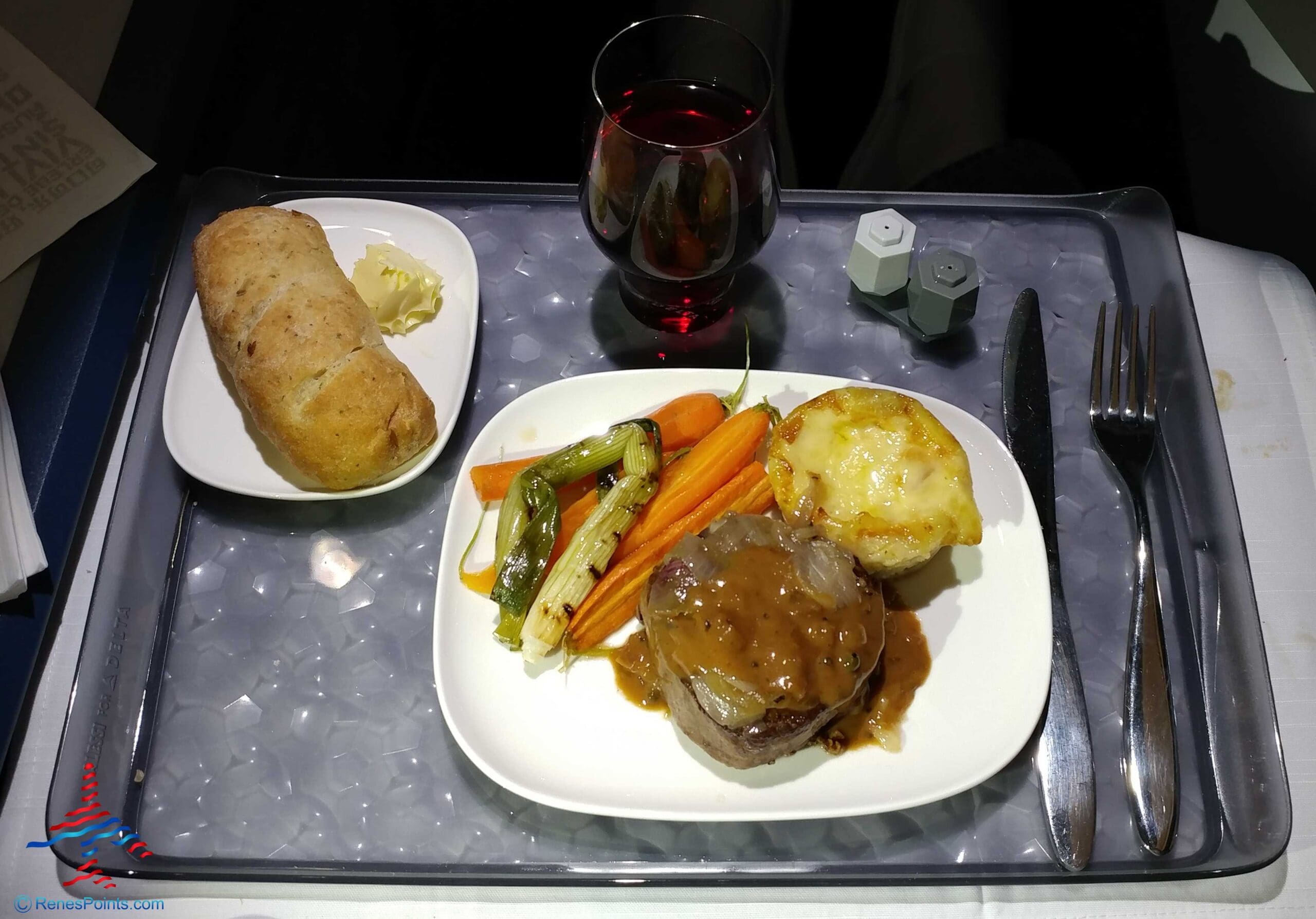 a plate of food on a tray