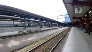 a train tracks next to a platform