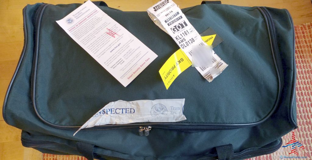 a bag with a ticket and a tag