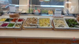 a buffet with different food in containers