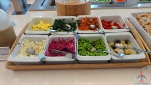 a tray of food with spoons