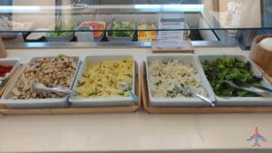 a row of bowls of food