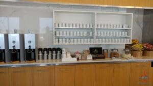 a counter with a shelf and shelves