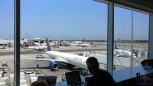 a group of people sitting at an airport