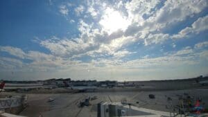 a blue sky with clouds and buildings