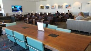 a long table with chairs in a room
