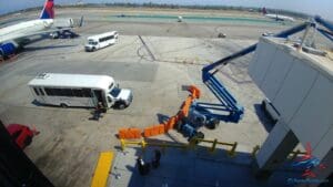 a group of buses parked at an airport