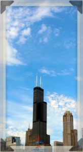 a tall building with two spires