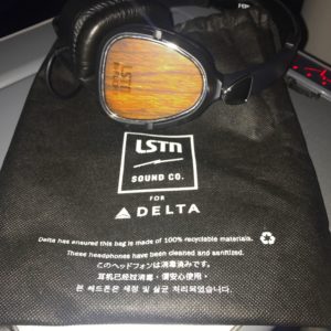 a pair of headphones on a black bag
