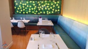 a table with a blue booth