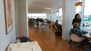 a room with a wood floor and a table