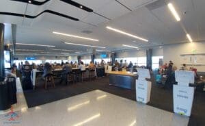 a group of people sitting at tables in a room