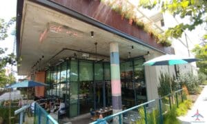 a building with glass walls and a railing