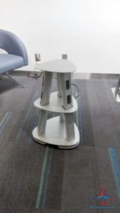 a white table on a carpet