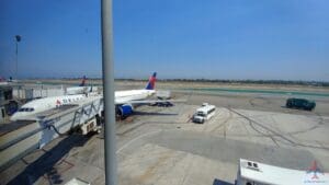 a group of airplanes at an airport