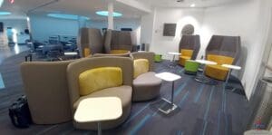 a room with chairs and tables