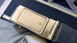 a metal buckle on a piece of fabric