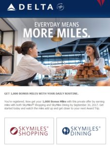 a woman handing over a tray of muffins