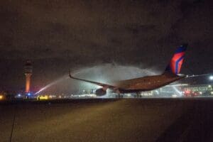 a jet plane taking off at night