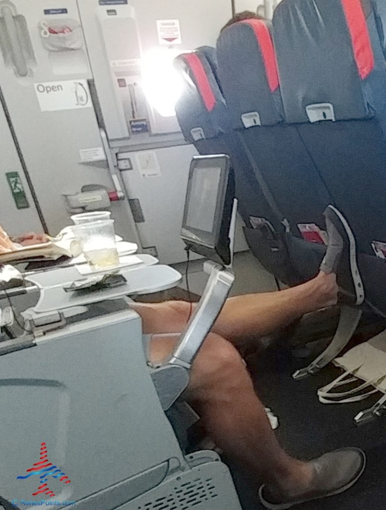 a person sitting in an airplane seat