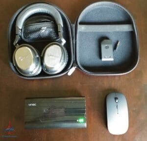 a mouse and headphones in a case
