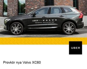 a car parked in front of a brick building