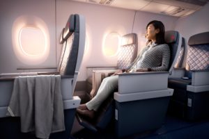 a woman sitting in an airplane