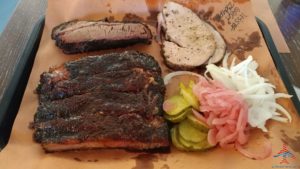 a plate of meat and vegetables