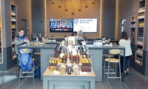a bar with a variety of bottles