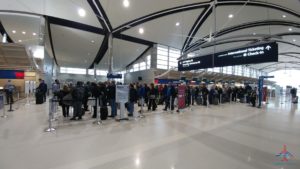 a group of people in a terminal