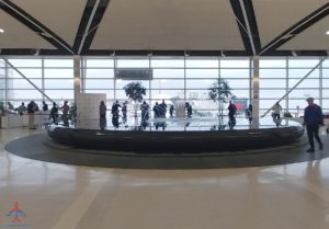 a group of people in a large building