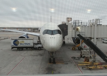 an airplane parked at an airport
