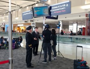 a group of people in an airport