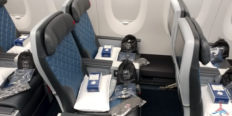 a seat with a few bags on it