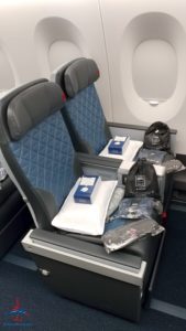 a seat with a few items on it