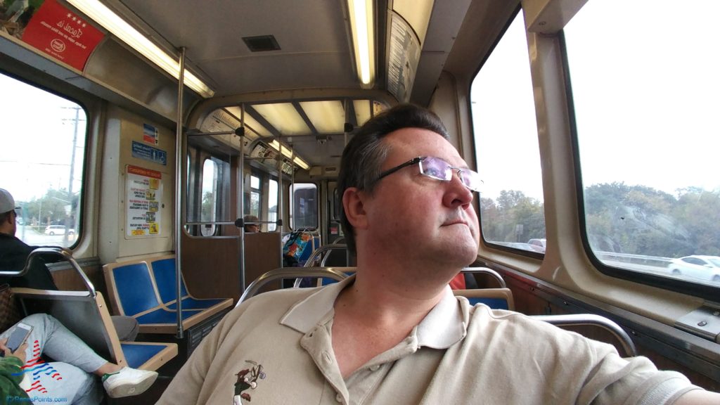 a man sitting on a bus
