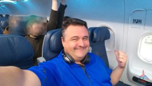 a man in a blue shirt