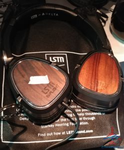 a pair of headphones on a black bag