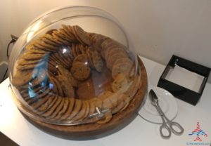 a glass container with cookies in it